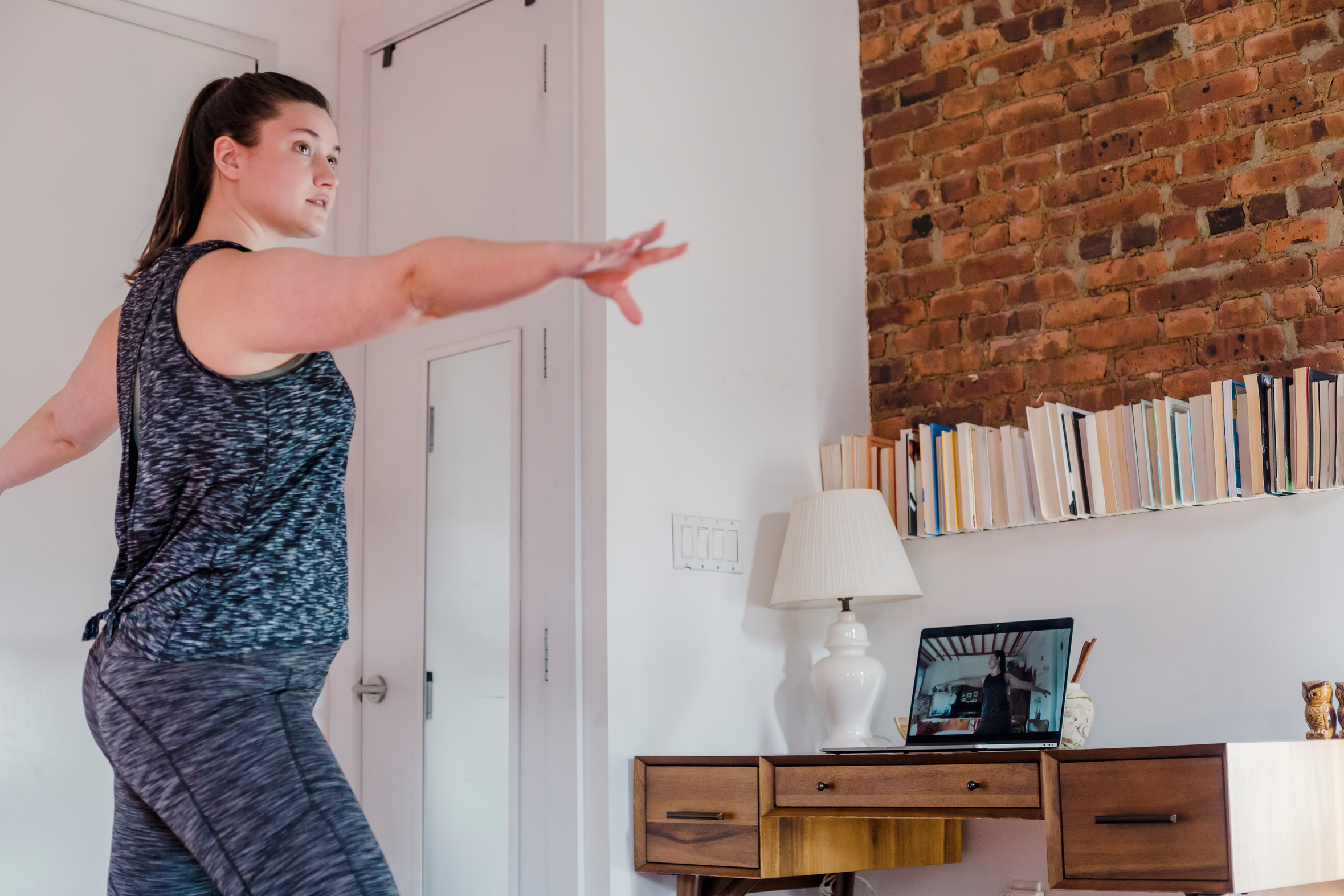 Woman Doing Online Yoga Class